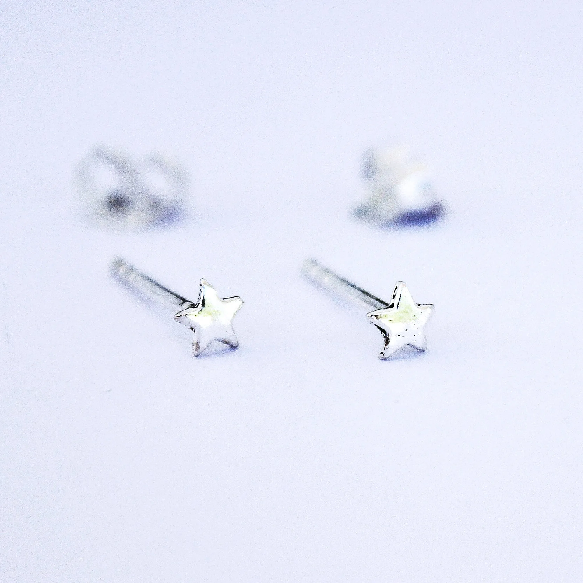 TINY STAR STUD EARRING